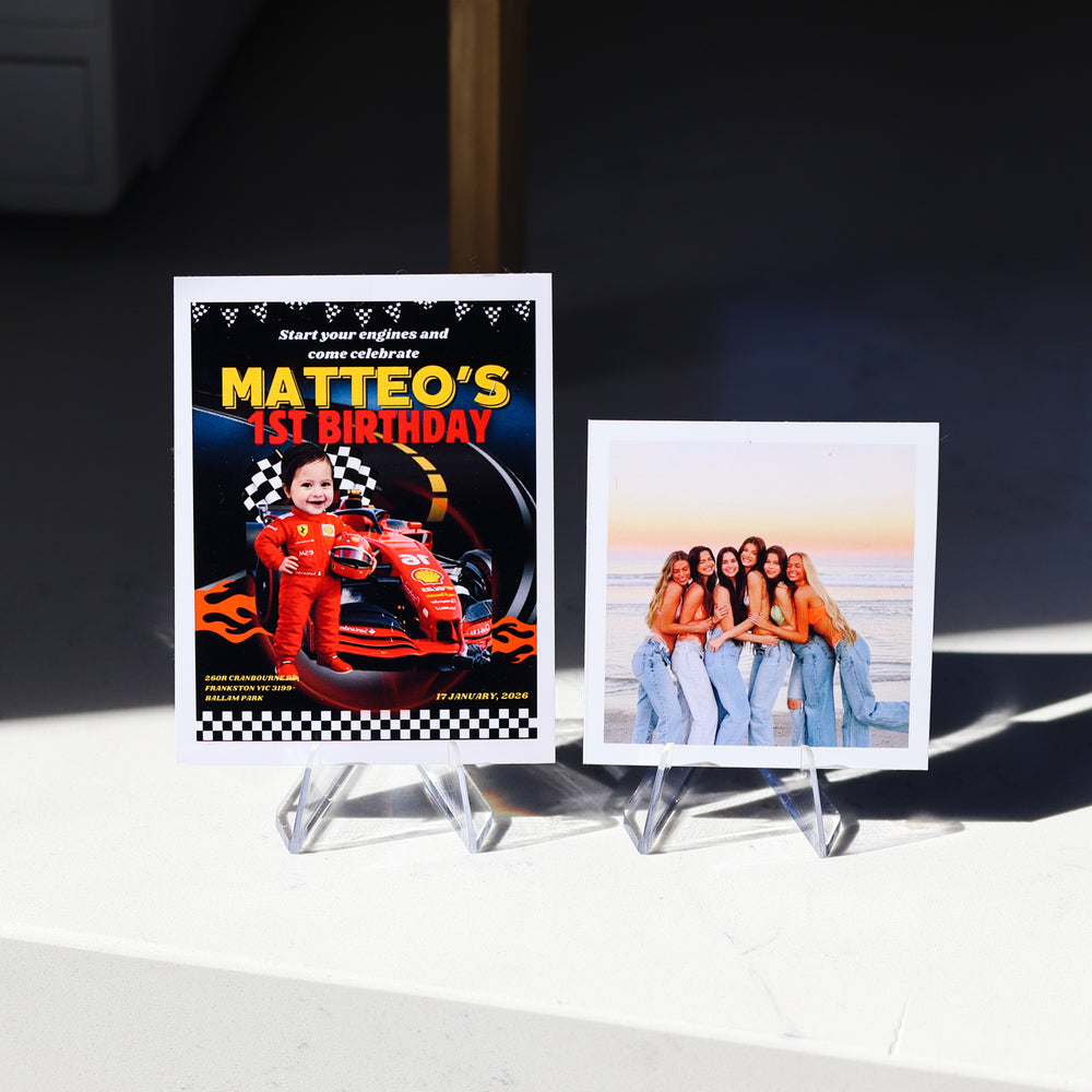 Printed photo magnets with a little boy named Matteo, standing on a display